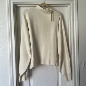 VICI EXCLUSIVE X FATE Cream Mock
Neck Sweater